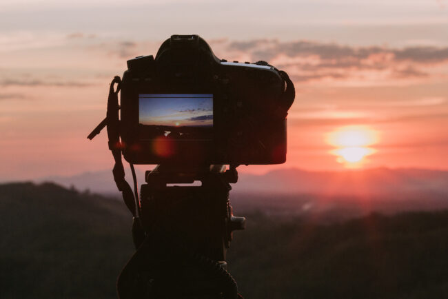 camera-with-nature-background